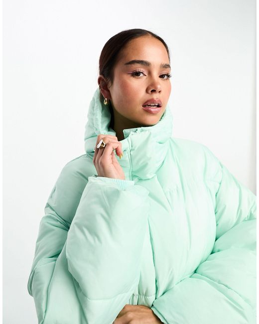 Doudoune à capuche - menthe Monki en coloris Vert | Lyst