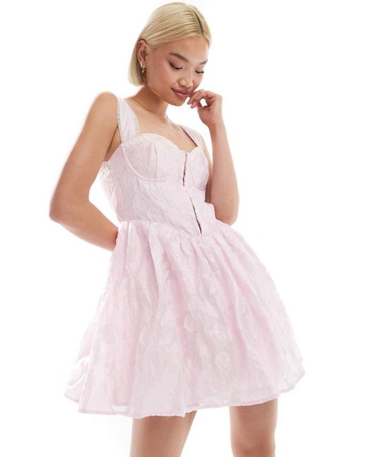 Love Triangle Mini-Jurk Met Korset En Getextureerde Bloemen in het Pink