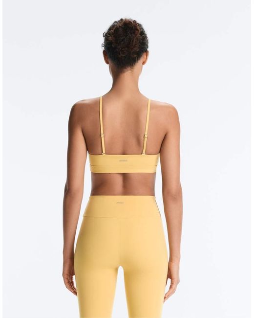 Oysho Yellow Comfortlux Light-support Sports Bra With Crossover Straps