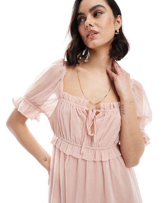 Vestido Corto Empolvado Con Mangas Abullonadas De Wednesday's Girl de color Pink