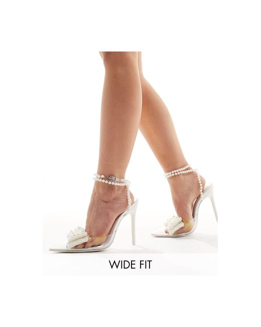 Glitzy - scarpe con tacco trasparenti con fiocco con perle di Public Desire in White