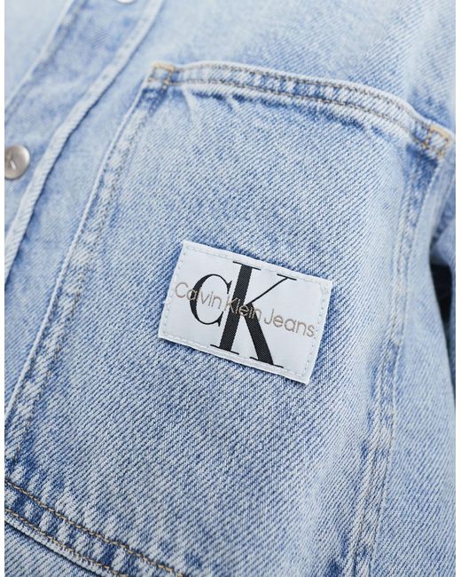 Surchemise en jean coupe carrée - clair délavé Calvin Klein en coloris Blue