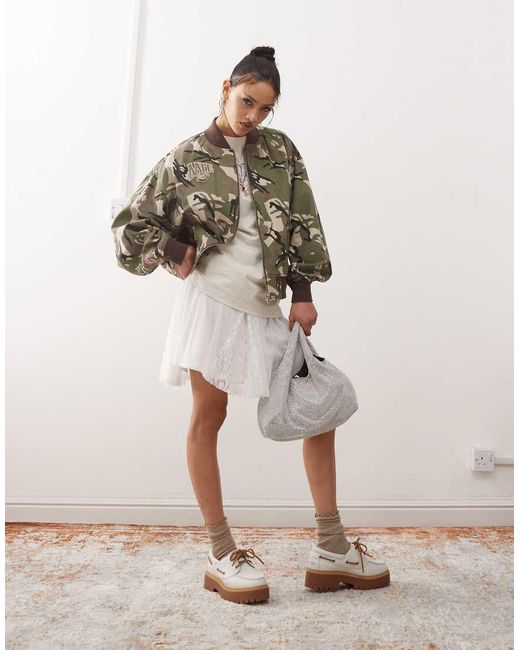 Aape By A Bathing Ape di Aape By A Bathing Ape in Brown