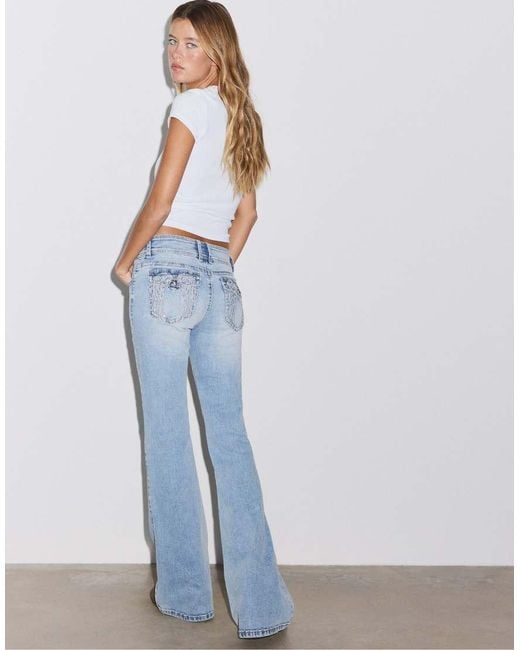 Stradivarius Blue Embroidered Bell Bottom Jeans With Pockets
