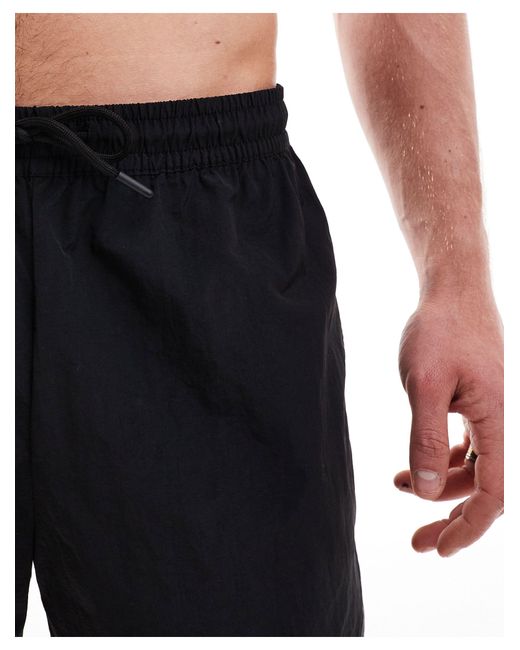 Weekday Blue Tan Runner Swim Shorts for men