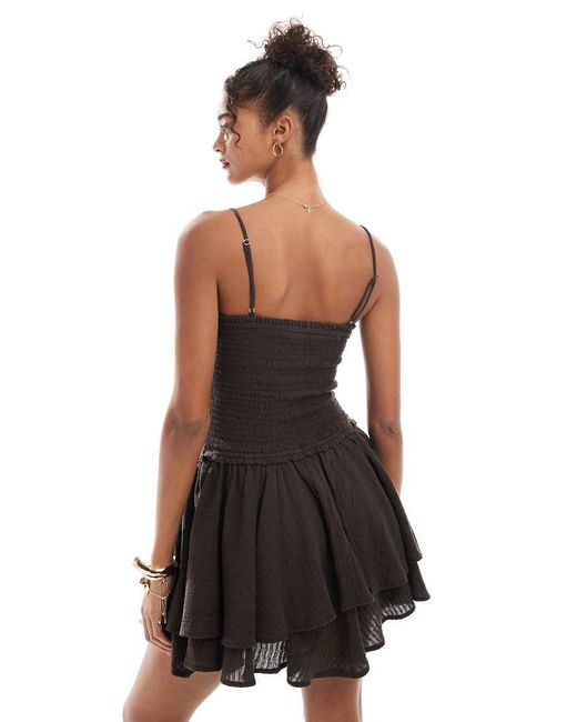 Stradivarius Gesmokte Mini Jurk Met Korset in het Black
