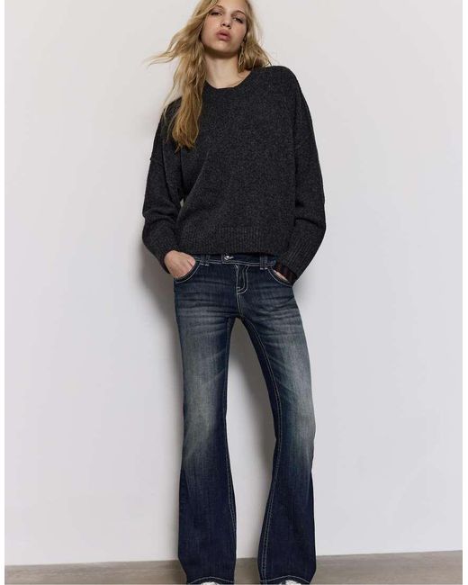 Stradivarius Blue Embroidered Pocket Bell Bottom Jeans