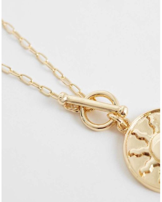 ASOS White T-bar Necklace With Sun Peandant