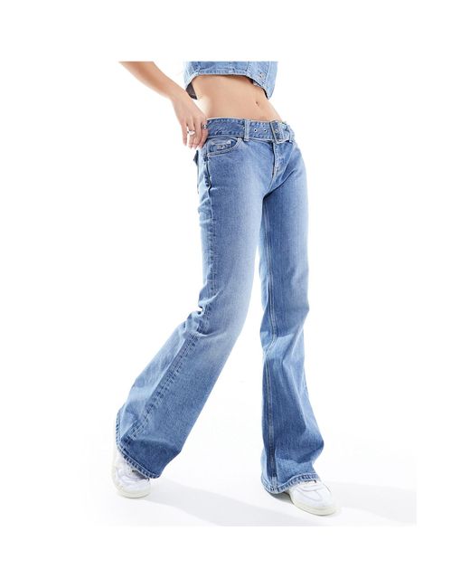 Sophie - jeans lavaggio medio a vita bassa con cintura di Tommy Hilfiger in Blue