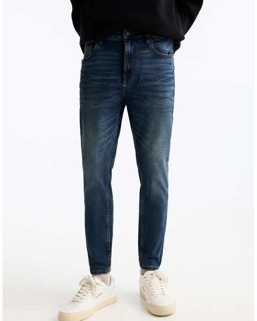 Jeans Carrot Slavato di Pull&Bear in Black da Uomo