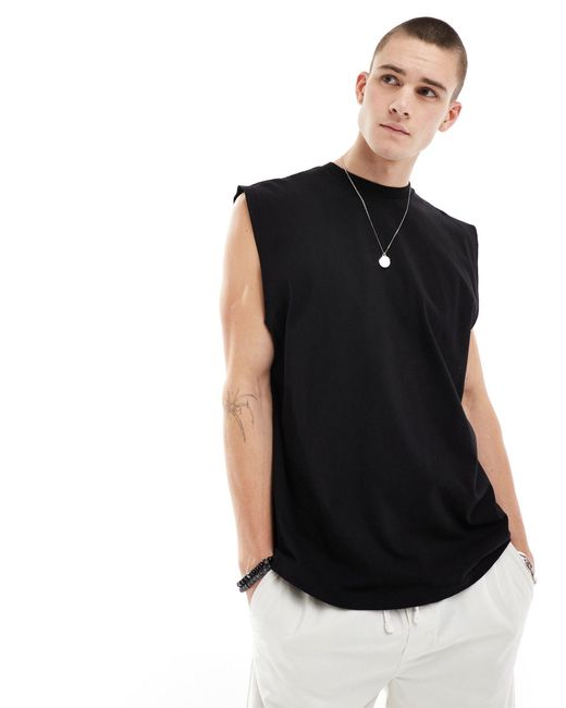 Camiseta negra extragrande sin mangas con estampado ASOS de hombre de color Black
