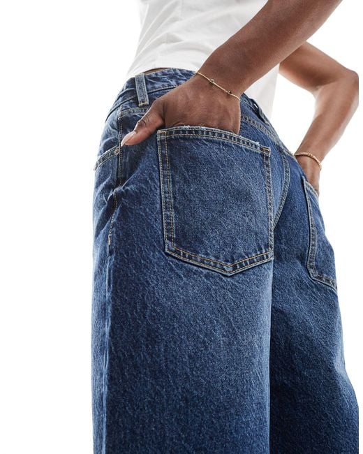 Bershka Blue – lange baggy jeans-shorts