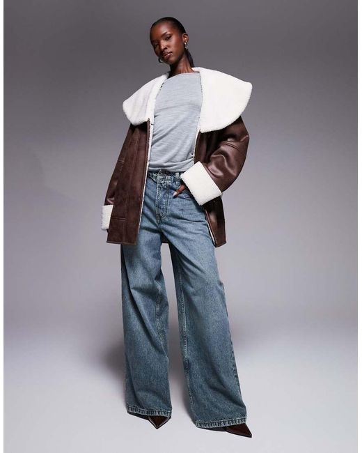 The Frolic Brown Exclusive Faux Shearling And Cream Borg Contrast Belted Coat