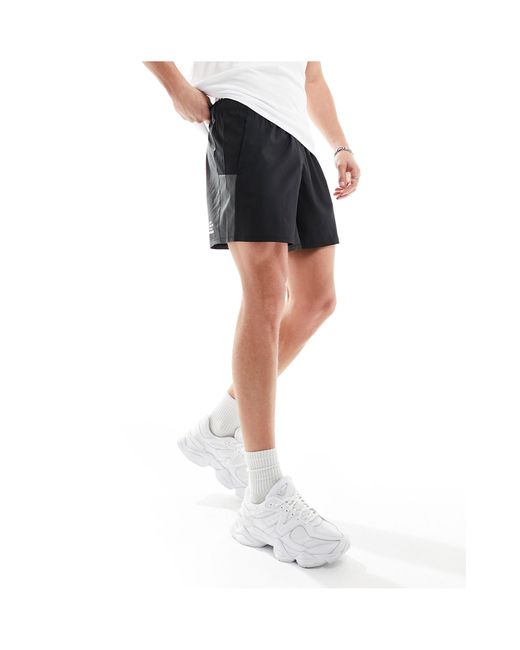 The North Face White Training Woven Logo Shorts for men