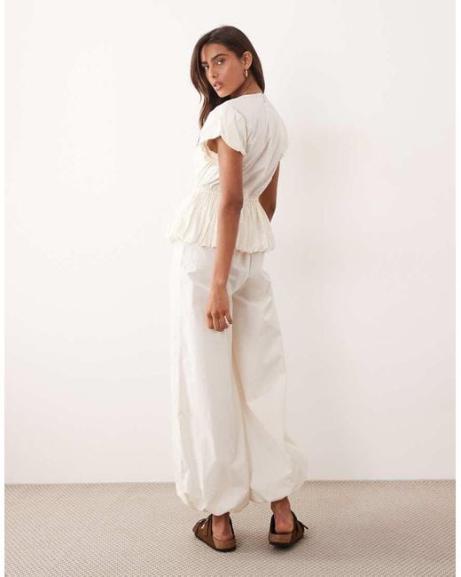ASOS Natural Jumpsuit With Peplum And Balloon Legs