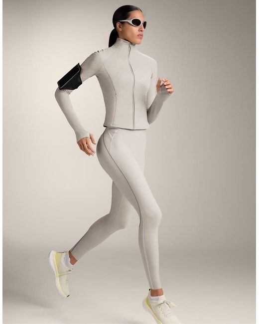 Oysho Natural Light Warm Reflective Technical Jacket