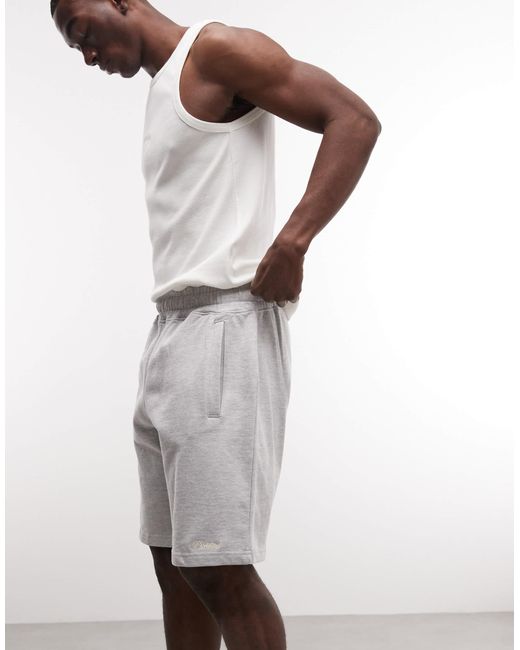 Bermuda molletonné Prohibited pour homme en coloris White