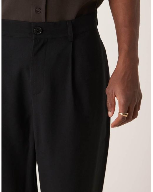 ASOS Nette Ruimvallende Broek in het Black voor heren