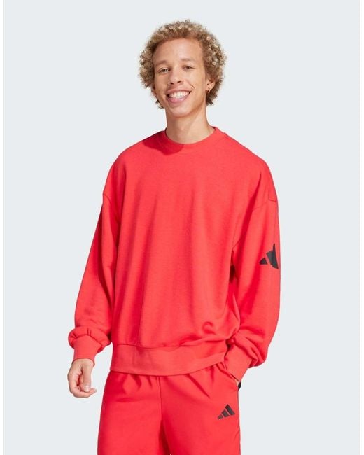 Adidas Originals Red Essentials Loose Fit 3 Bar Logo Sweatshirt for men