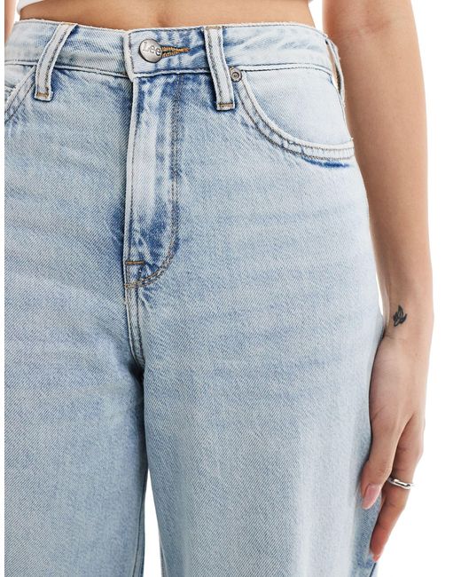 Stella - jeans ampi svasati lavaggio chiaro con orlo scucito di Lee Jeans in Blue