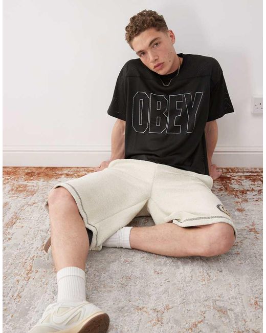 Camiseta Negra De Estilo Fútbol Con Logo Grande De Obey de hombre de color Brown