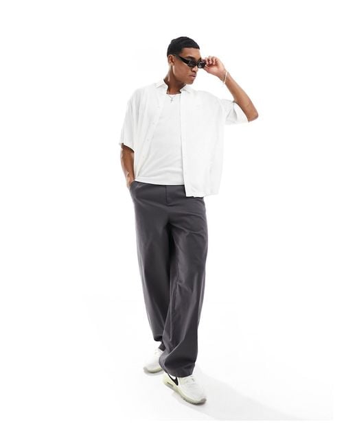 Armani Exchange White Logo Button Through Short Sleeve Boxy Fit Jersey Shirt for men