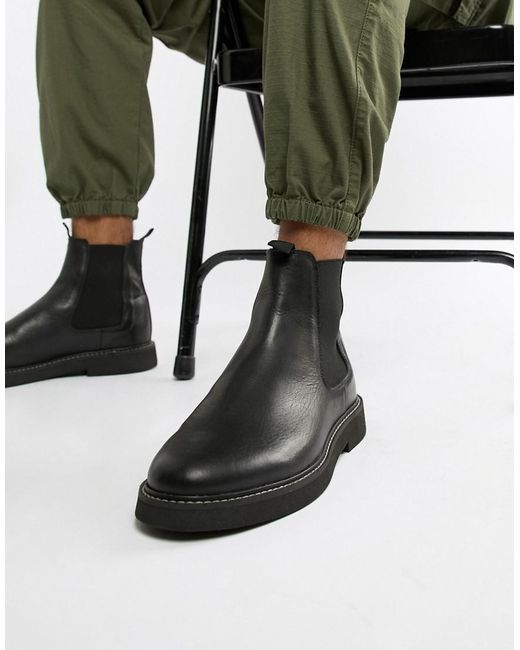 easton chunky sole ankle chelsea boot in black faux leather