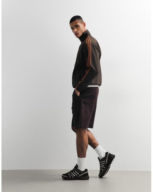 Adidas Originals Black Firebird Woven Track Top for men