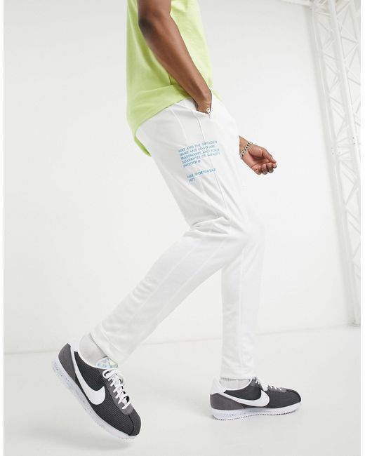 Nike Swoosh Pack Polyknit Cuffed joggers in White for Men | Lyst UK