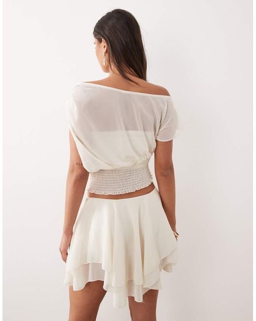 The Frolic Natural Exclusive Chiffon Drape Off Shoulder Shirred Waist Top