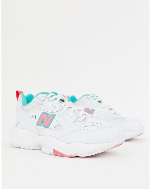 608 - Sneakers bianche, rosa e verdi con suola spessa di New Balance in Blue