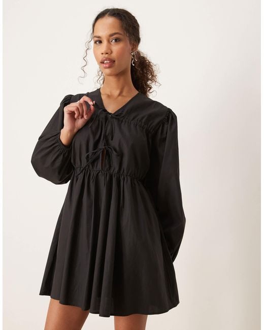 Robe courte nouée - charbon Ghospell en coloris Black