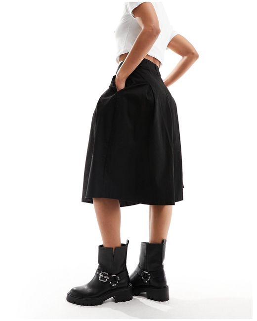 Falda negra plisada por la rodilla ASOS de color Black