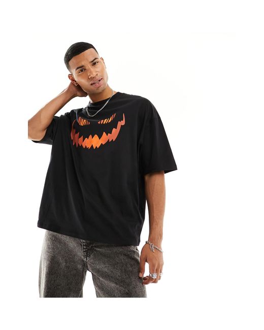 Halloween - t-shirt oversize avec imprimé visage en citrouille ASOS pour  homme en coloris Noir | Lyst