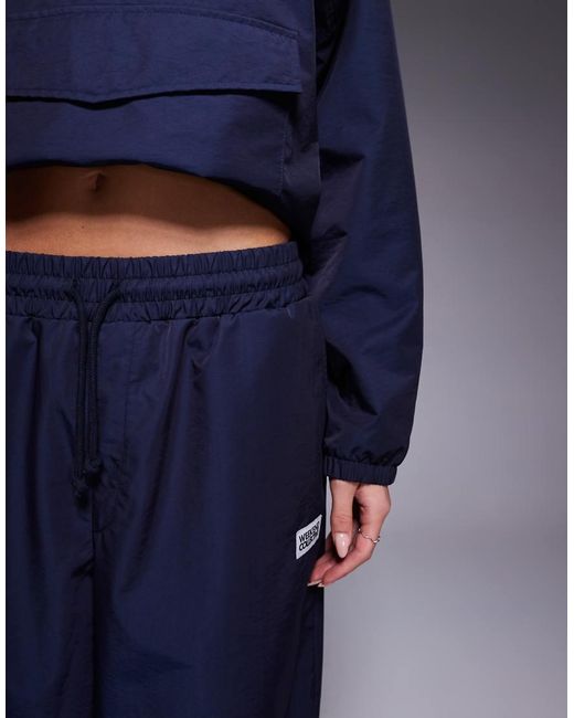 ASOS Blue Weekend Collective Barrel Leg Nylon Trackies