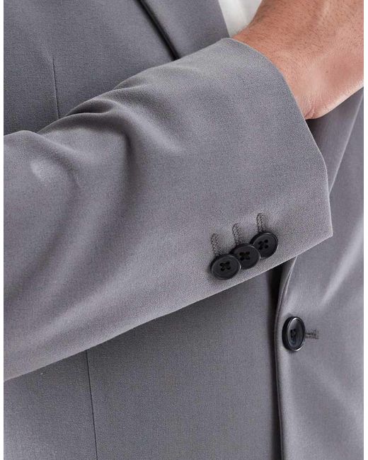 Chaqueta De Traje Entallada De Tejido Elástico En Cuatro Direcciones De ASOS de hombre de color Blue