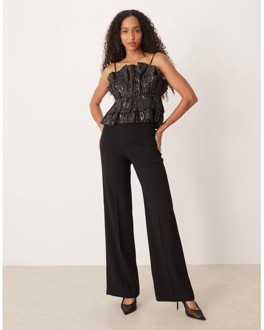 Top à volants oversize - pailleté Y.A.S en coloris Black