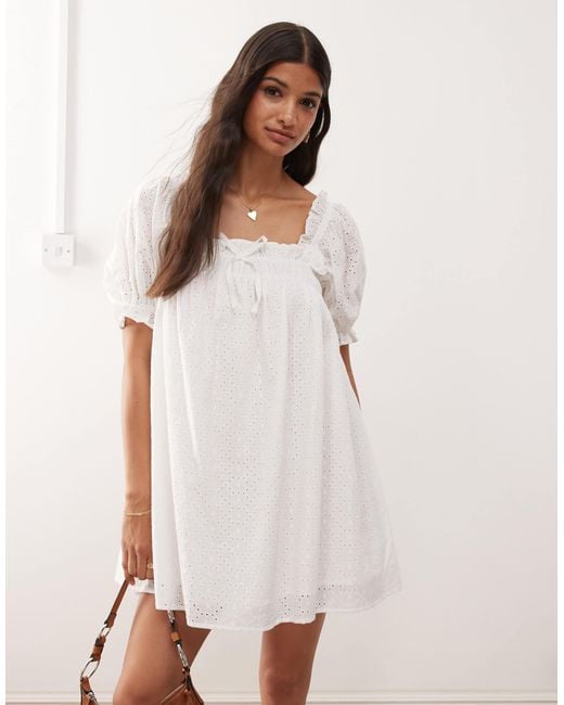 white long sleeve babydoll dress Super Oversized BK NK Shirt Babydoll Mini Dress