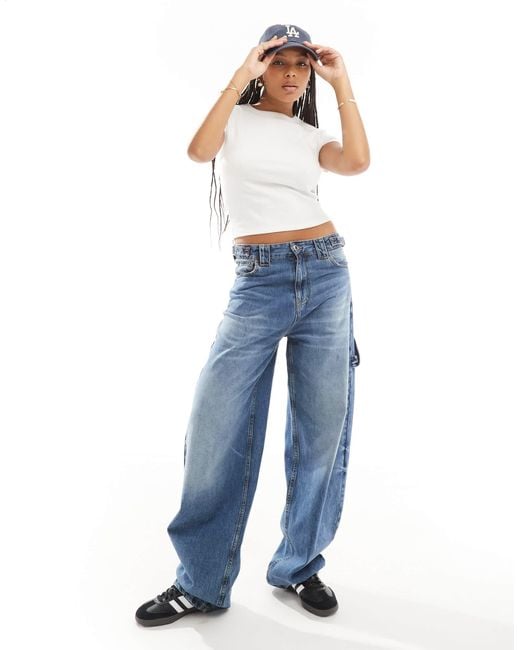 Jean Stradivarius Flare - Taille M (42 EUR) - Bleu Moyen Délavé - Occasion Très Bon état