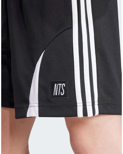 Adidas Originals Shorts ADIDAS X NTS RADIO ALLOVER PRINT SST HOSE in Black für Herren