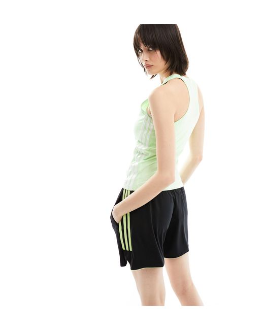 Camiseta pastel sin mangas con tres rayas training essentials Adidas Originals de color Green