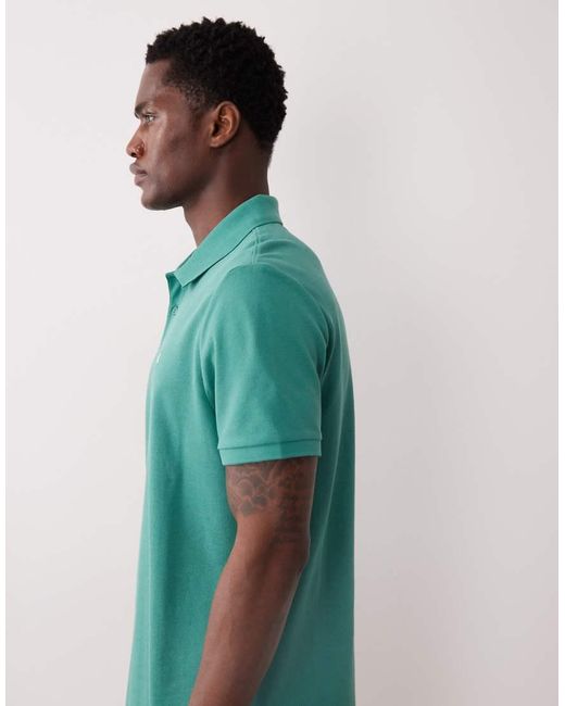 Calvin Klein Green Monogram Pique Polo Shirt for men