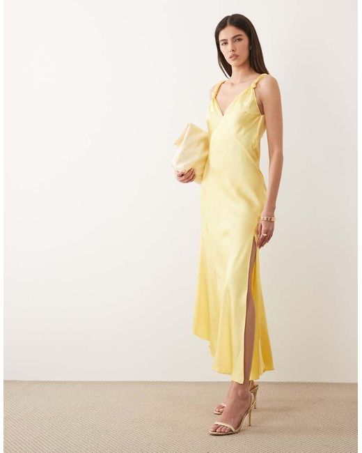 asos design satin bias midi cami slip dress in yellow ASOS DESIGN pleated midi cami dress in pale yellow