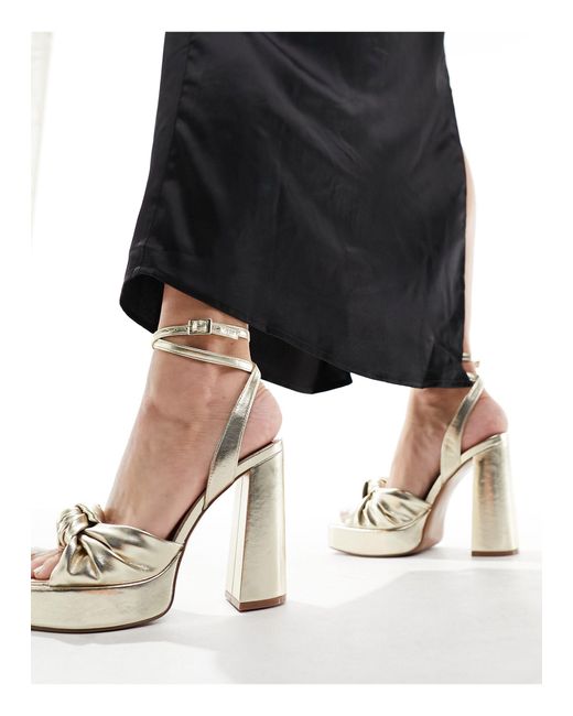 Nikita - sandales à talon carré et semelle plateforme avec détail noué ASOS en coloris Black
