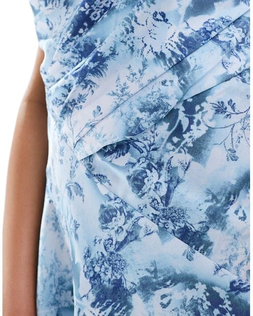 Robe courte asymétrique coupée en biais à encolure bandeau et imprimé fleuri - bleu ASOS en coloris Blue