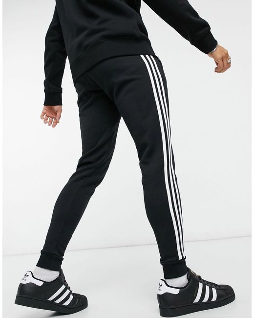 adidas Originals Adicolor Three Stripe Skinny joggers in Black for Men -  Save 4% | Lyst Australia