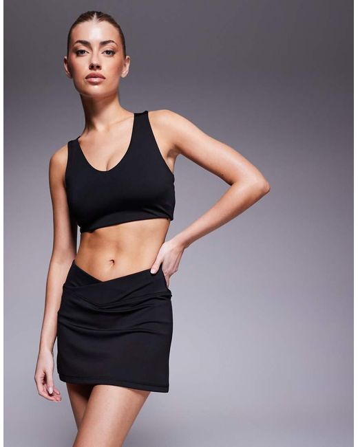 Falda Negra De Estilo Tenista Con Cintura Cruzada, Pantalones Cortos Integrados Y Bolsillo Para Móvil De 4505 de color Blue