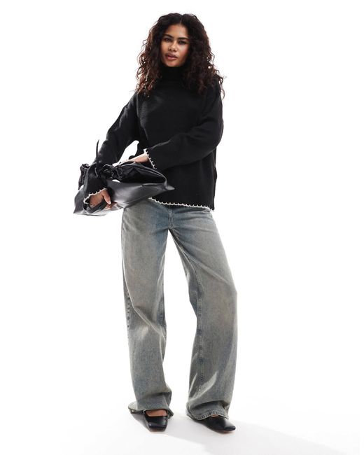 Pull à col montant avec bordures en point ASOS en coloris Black
