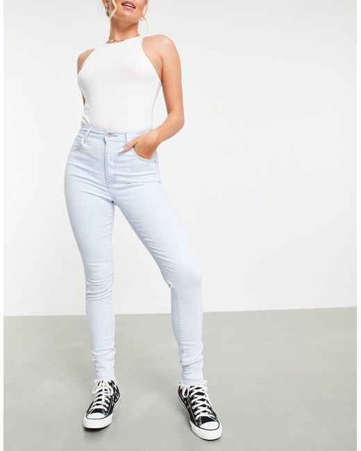 Mile high - jean super skinny en denim clair délavé Levi's en coloris White