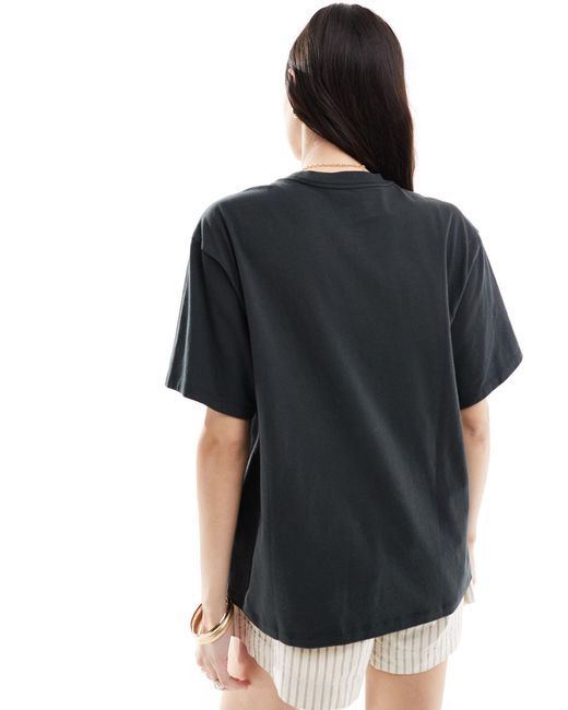 T-shirt oversize à imprimé surf Levi's en coloris Black